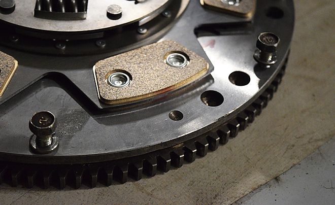 Vehicle undercarriage inspection before flywheel replacement